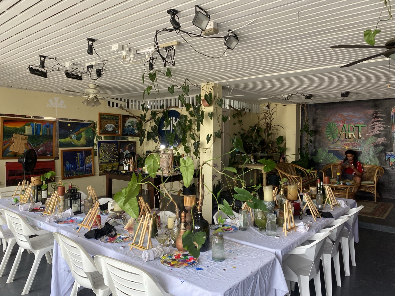 Daytime painting setup inside The Art Garden