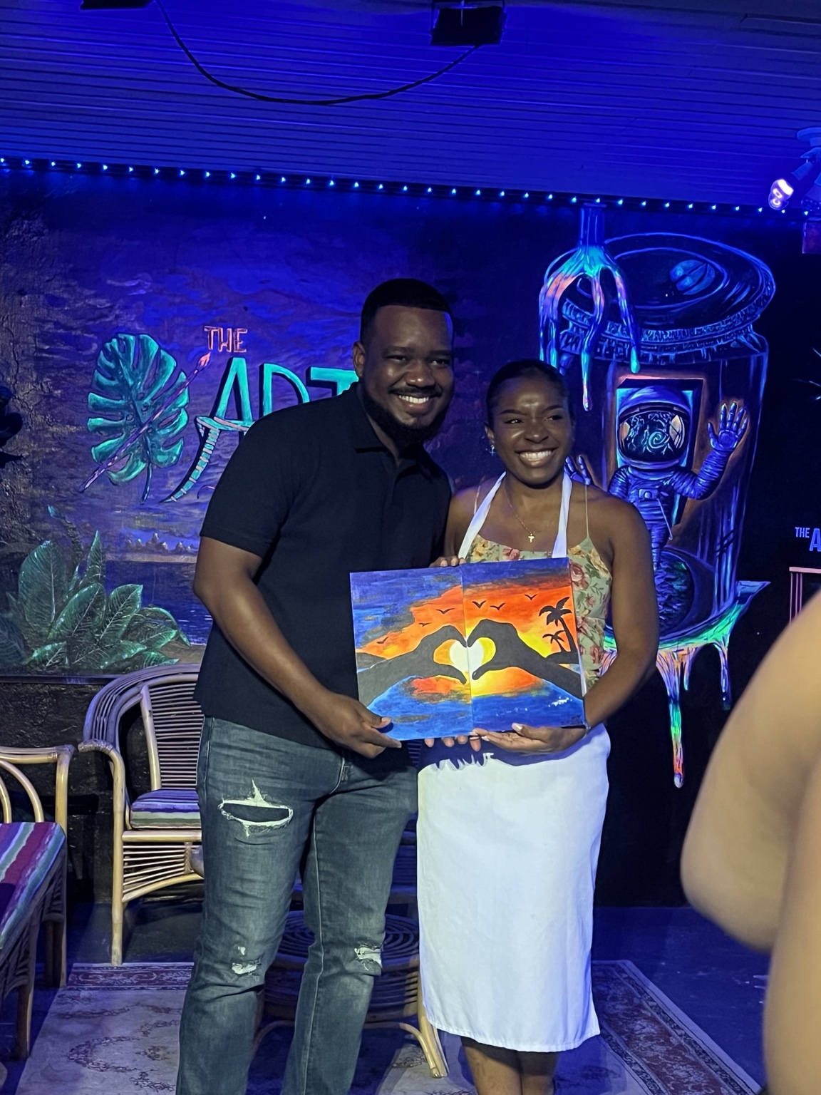 Guests celebrating with artwork